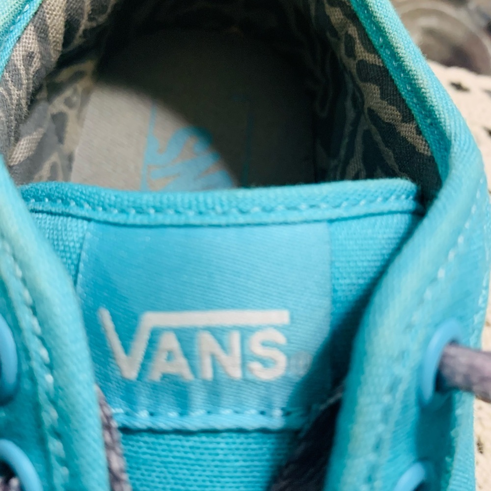 Vans Turquoise w/gray accents. Size 5 Women’s. Worn only once.